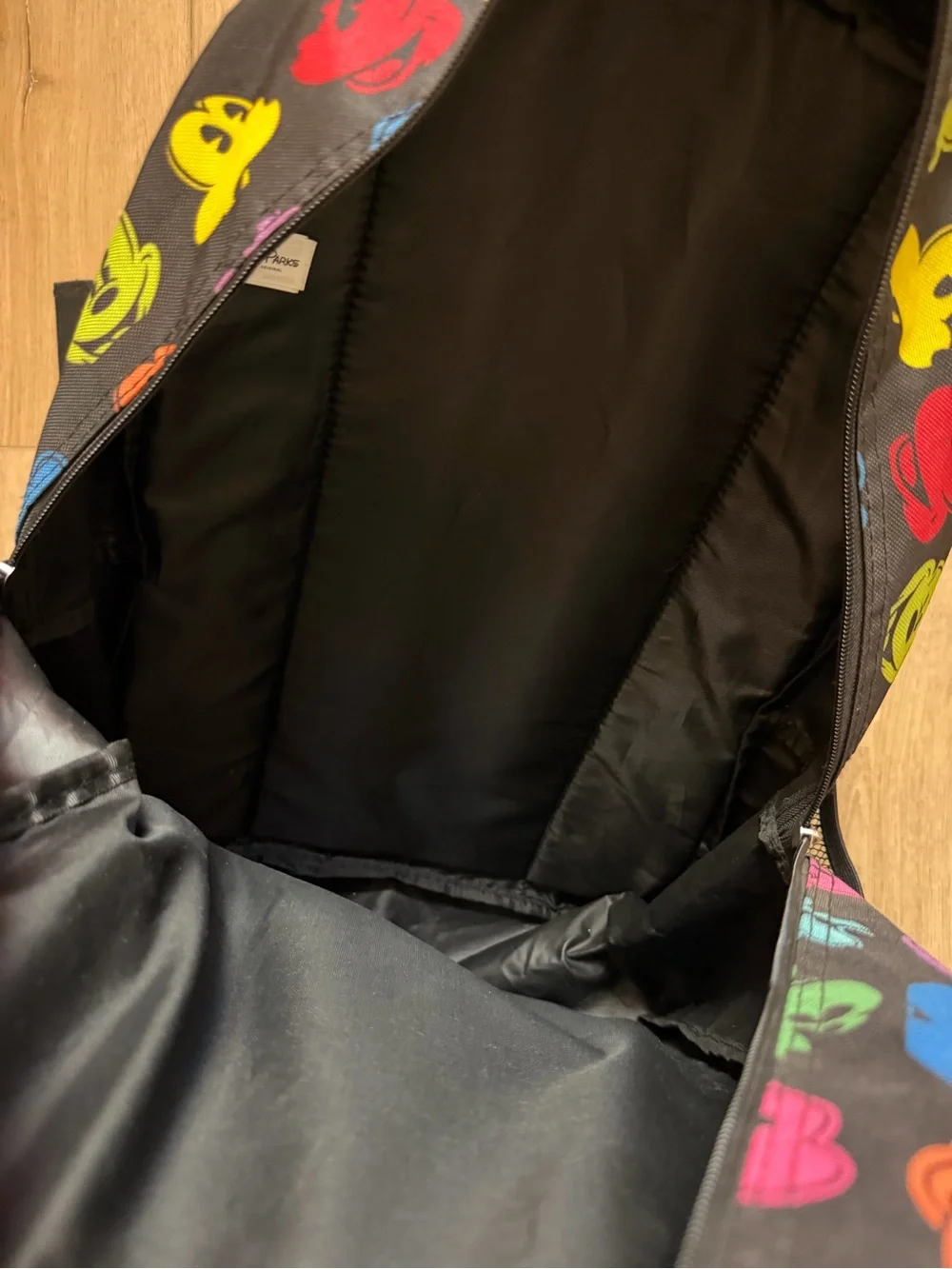 Disney Black Backpack with Multi-Color Mickey Heads